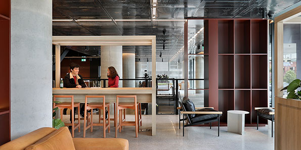 students chatting in the common area of Iglu Flagstaff Gardens student accommodation in Melbourne